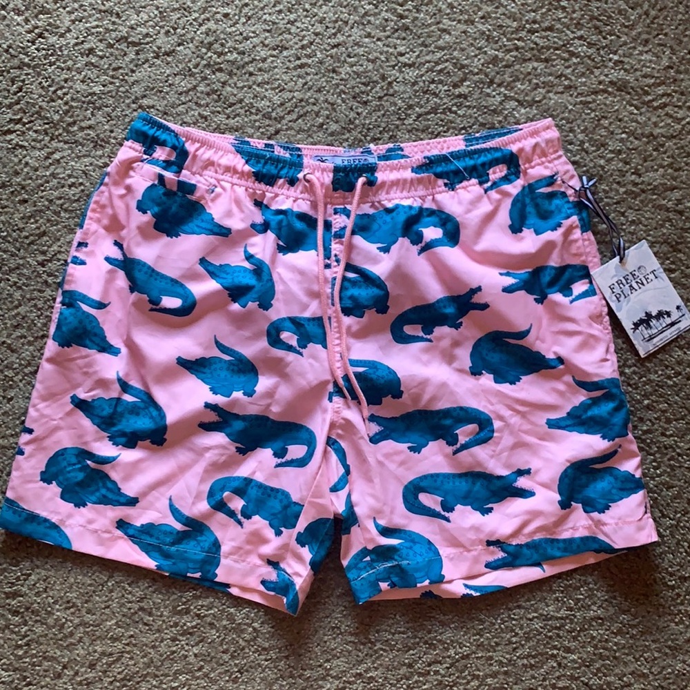 Free Planet pink swim trunks with green alligators
